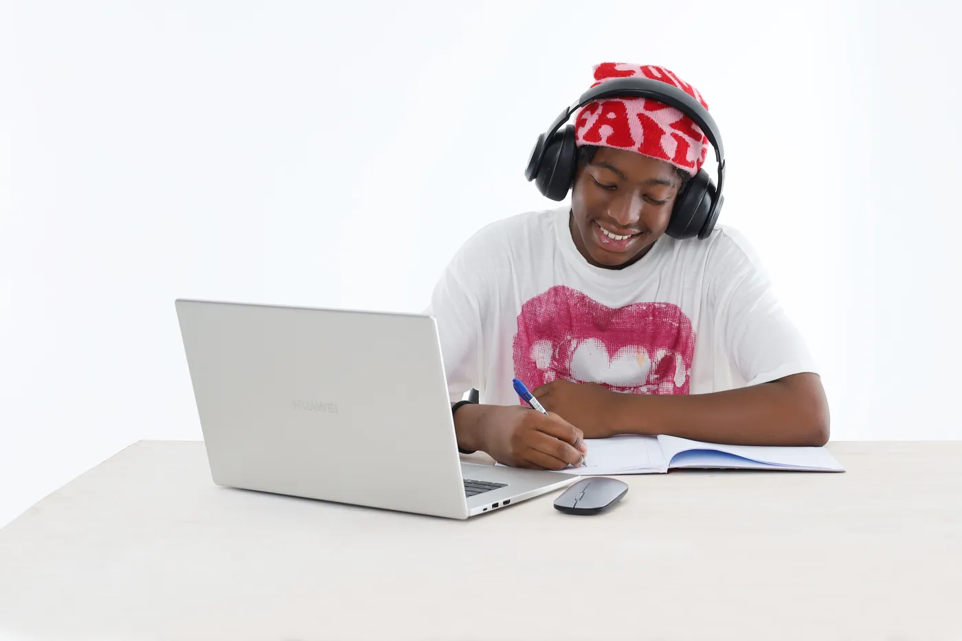 An Apex learner joining a live online Maths class from home, with headphones and a laptop.