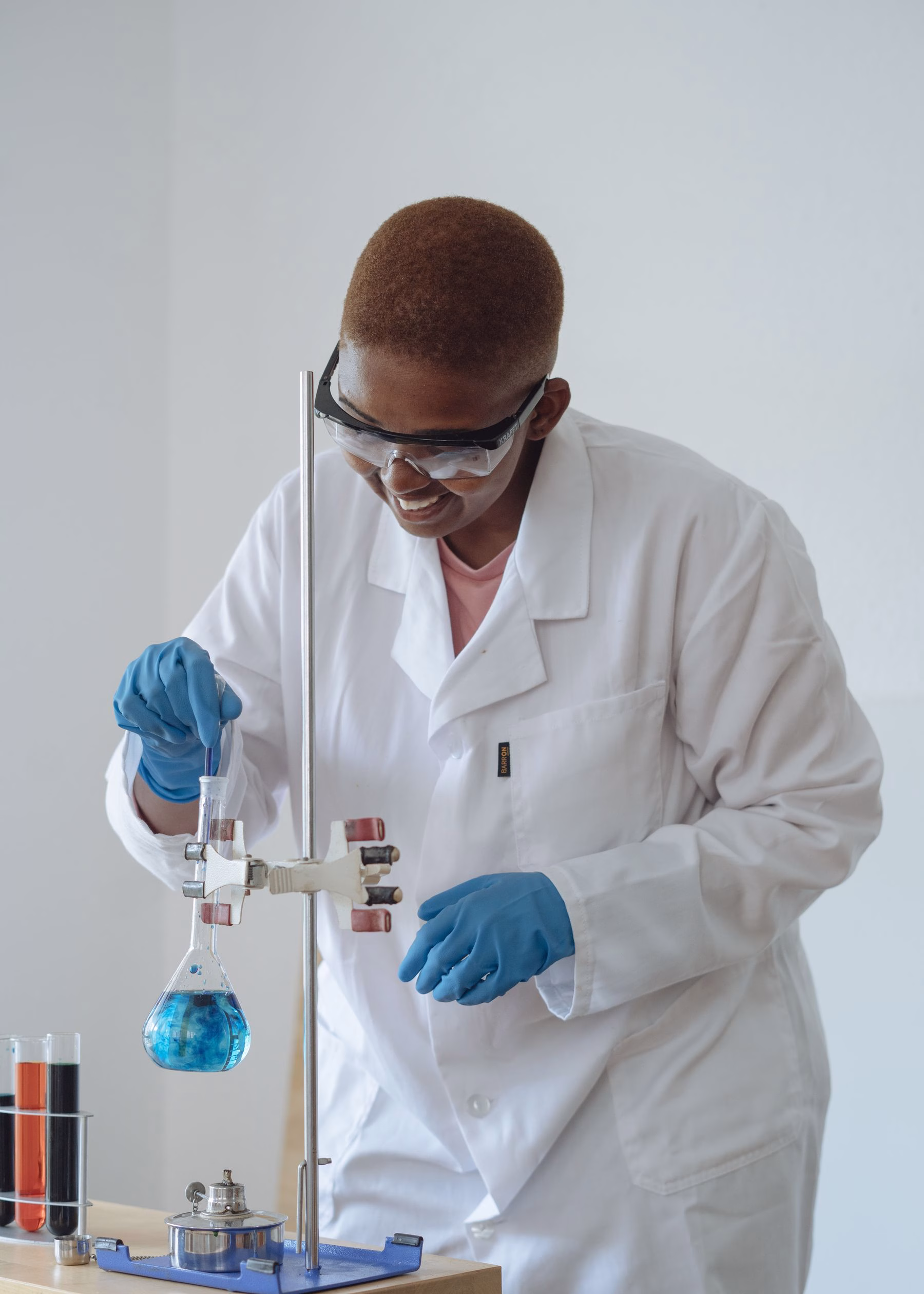 South African Pearson Edexcel International AS Level student working in a chemistry laboratory